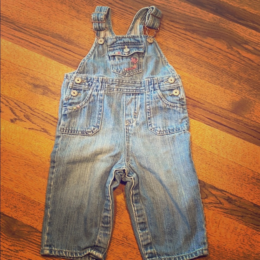 Oshkosh overalls. Flower and butterfly pocket.